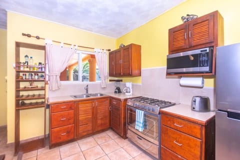 Condo, 2 Bedrooms | Private kitchen | Fridge, coffee/tea maker, toaster