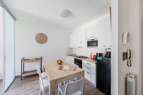 Apartment | Private kitchen | Full-size fridge, microwave, oven, stovetop