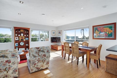The dining table is part of the open plan living spaces.