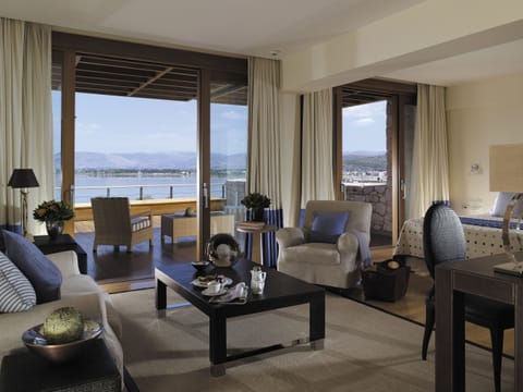 Luxury Suite, Sea View | Minibar, in-room safe, soundproofing, iron/ironing board