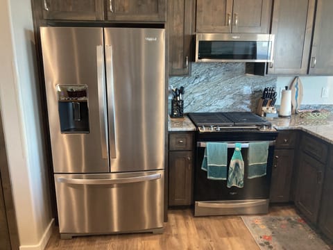 Fridge and bottom pull out freezer door. 
Ice maker in freezer and in door.