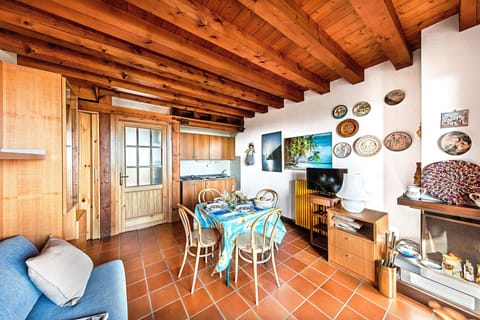 Apartment, Pool View | Living area | 35-inch flat-screen TV with digital channels