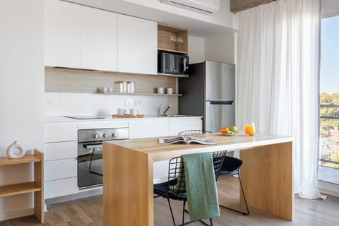 Standard Apartment | Private kitchen | Fridge, microwave, oven, toaster