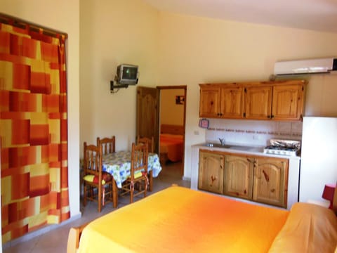 Apartment | Private kitchenette | Fridge, stovetop, coffee/tea maker, cookware/dishes/utensils