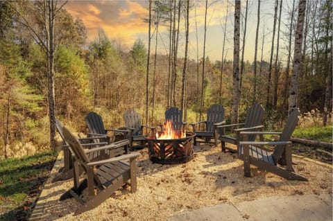 Gather around the fire pit with seating for the whole group and stunning views.