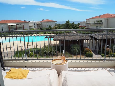 Enjoy sun all day on the outdoor beanbags overlooking the pool and out to sea.