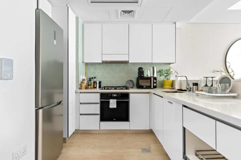 Panoramic Apartment | Private kitchen | Fridge, microwave, oven, stovetop