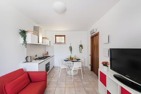 Apartment, Courtyard View | Living area | 35-cm TV with digital channels