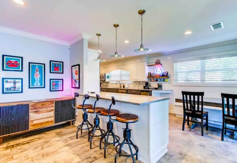 The kitchen features modern appliances and a bright, inviting atmosphere for all your culinary adventures.