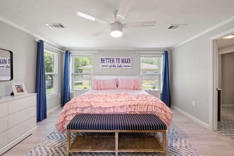 Main Bedroom, Wake up with views of the water. Room features phone chargers, sound machine and black out curtains  and a fan to make you feel at home.