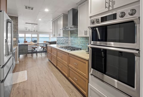 This kitchen features high-quality appliances to make your cooking a breeze