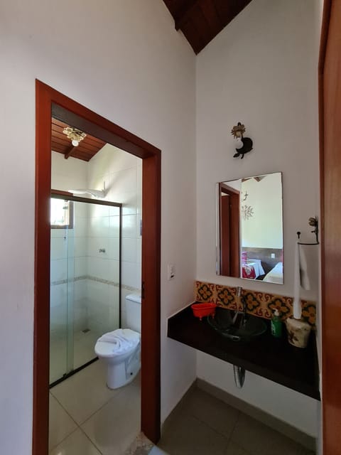 Basic Chalet, Lanai | Bathroom | Shower, rainfall showerhead, hair dryer, towels