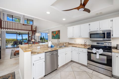 Kitchen w/ ocean view from entry - Open-concept kitchen with ocean view as soon as you walk in.