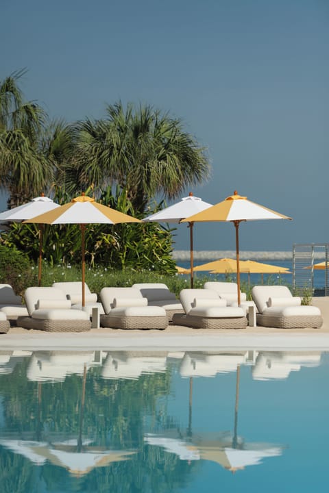 Outdoor pool, open 8:00 AM to 7:00 PM, cabanas (surcharge)