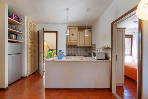 Apartment | Private kitchen | Full-size fridge, microwave, oven, stovetop