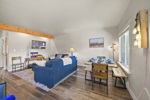 Our cozy living room with comfy sofas, soft pillows, and ample natural light.