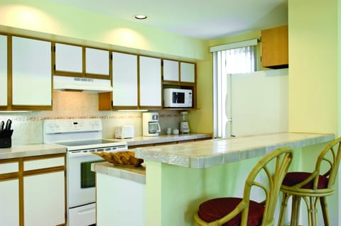 One Bedroom Suite | Private kitchen | Fridge, microwave, coffee/tea maker