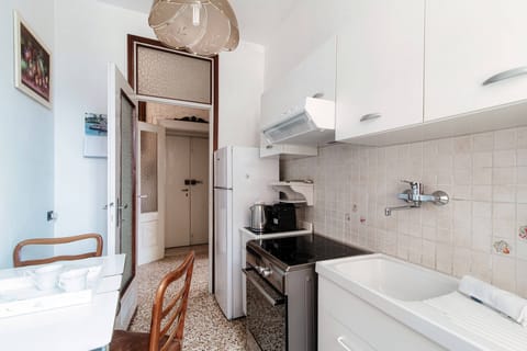 Apartment, Balcony, Lake View | Private kitchen | Full-size fridge, oven, stovetop, espresso maker