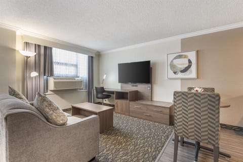 Suite, Multiple Beds, Non Smoking, Kitchen (Third bed is a Sofabed, Full Kitchen) | In-room safe, desk, laptop workspace, iron/ironing board