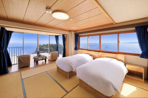 Deluxe Double or Twin Room with Ocean View, Non Smoking | Free WiFi, bed sheets