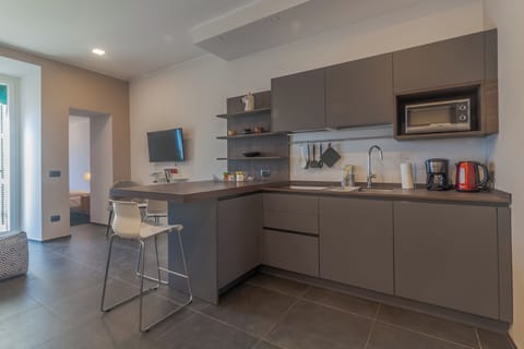 Apartment | Private kitchen | Full-size fridge, microwave, oven, stovetop