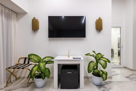 Family Apartment, 2 Bedrooms, Kitchenette, Partial Sea View | Terrace/patio