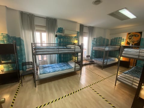 Shared Dormitory, Mixed Dorm, Shared Bathroom (1 bed in a 8-Bed Dormitory Room) | Individually decorated, blackout drapes, free WiFi, bed sheets