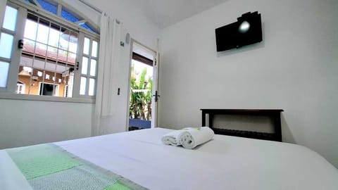 Comfort Suite, Balcony, Courtyard View | Desk, laptop workspace, blackout drapes, iron/ironing board