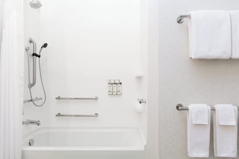 Combined shower/tub, hair dryer, towels, toilet paper