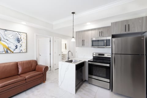 Signature Suite, 2 Bedrooms | Private kitchen | Full-size fridge, microwave, oven, stovetop