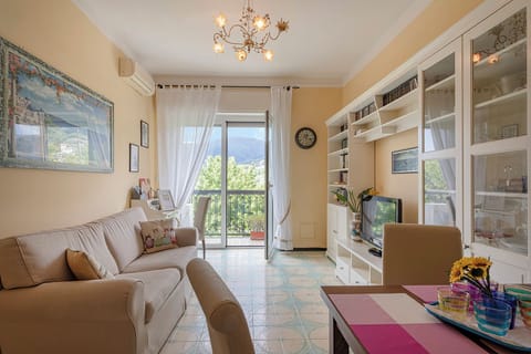 Apartment, Hill View | Living area | 35-inch TV with digital channels