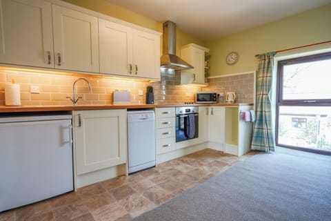 Lathkill Cottage | Private kitchen | Fridge, microwave, oven, stovetop