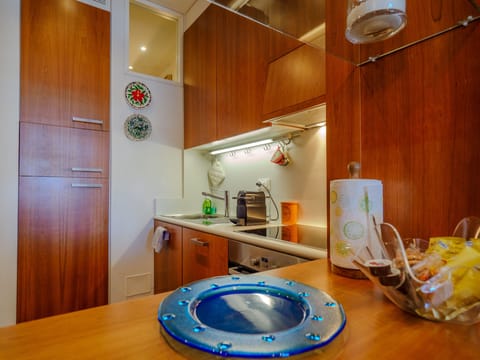 Design Apartment, Sea View | Private kitchen | Fridge, oven, stovetop, coffee grinder
