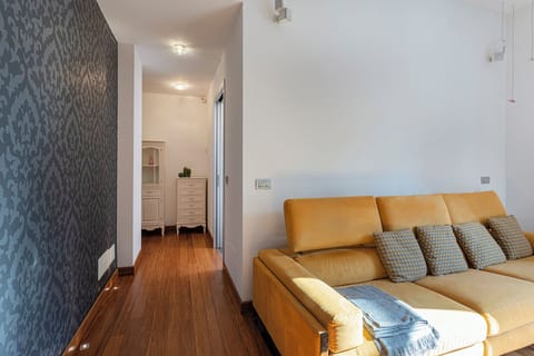 Apartment | Living area | 30-inch flat-screen TV with digital channels