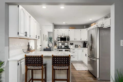 Lovely kitchen with bar stools and kitchen island great enjoying with family and friends
