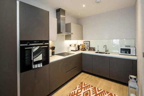 Apartment | Private kitchen | Fridge, microwave, oven, stovetop