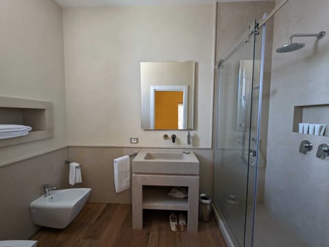 Exclusive Room | Bathroom | Shower, rainfall showerhead, designer toiletries, hair dryer