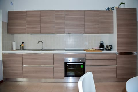 Apartment, Patio, Garden View | Private kitchen | Fridge, microwave, oven, stovetop