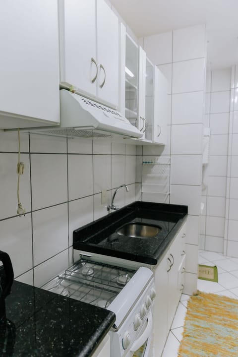 Family Apartment | Private kitchen | Cookware/dishes/utensils, dining tables