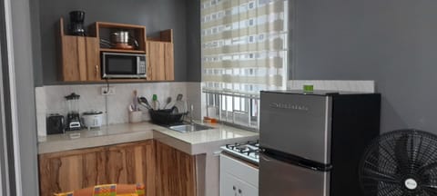 Apartment | Private kitchen | Fridge, microwave, oven, stovetop