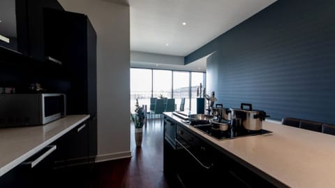 Penthouse, 3 Bedrooms | Private kitchen | Full-size fridge, microwave, dishwasher, coffee/tea maker