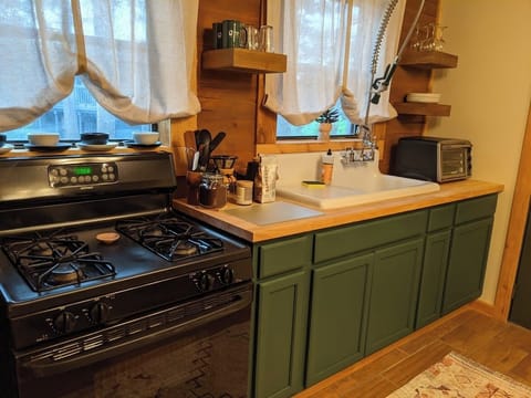 CampHouse + Hot Tub + Full Kitchen at Loblolly Pines | Private kitchen | Full-size fridge, microwave, oven, stovetop