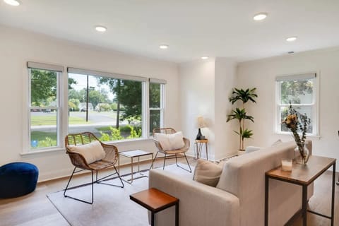 Living Room: Cozy Family Room - Gather with loved ones in this comfortable and inviting living room, perfect for family time.