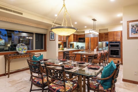 Dining area with seating for six, open to the kitchen for easy gathering.