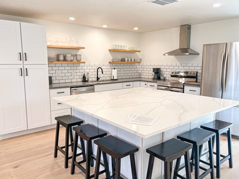 Fully stocked kitchen with XL island 