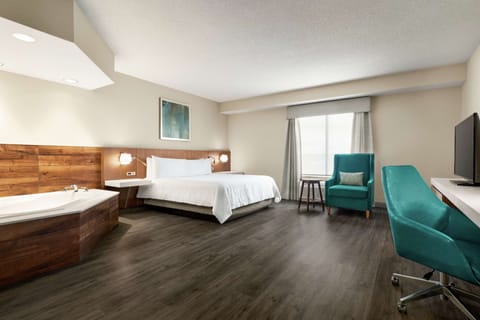 Suite, 1 Bedroom, Jetted Tub (1 King) | Hypo-allergenic bedding, desk, laptop workspace, blackout drapes