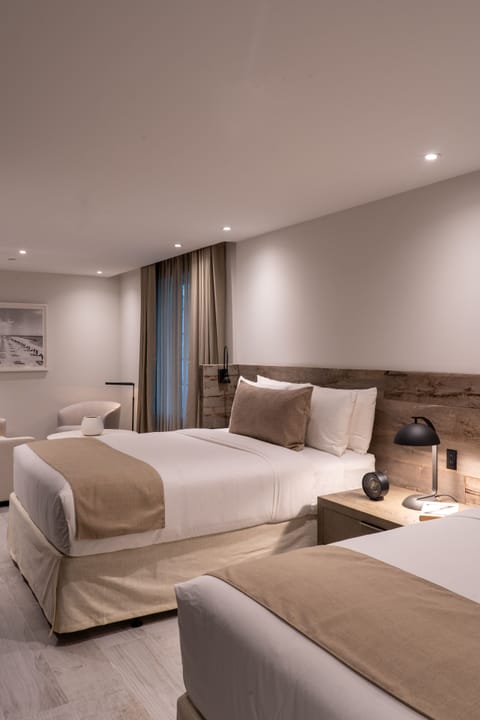 Deluxe Suite, 2 Queen Beds | Premium bedding, in-room safe, desk, blackout drapes