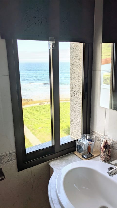 Standard Double Room, Beach View | Bathroom | Shower, designer toiletries, hair dryer, towels