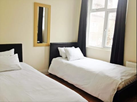 Basic Twin Room | Blackout drapes, iron/ironing board, free WiFi, bed sheets