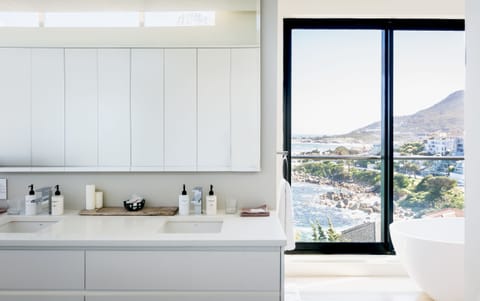 Executive Suite, Sea View | Bathroom | Shower, designer toiletries, hair dryer, bathrobes